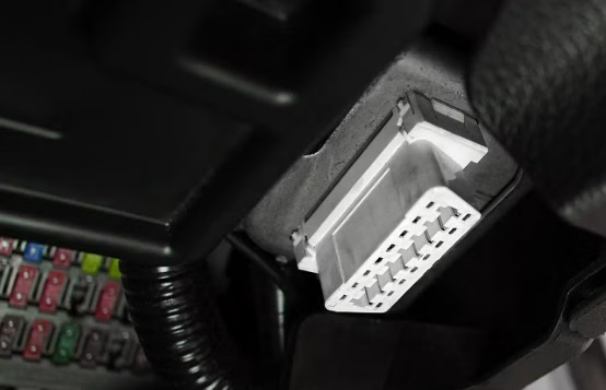 OBD-II port diagnostic socket under dashboard